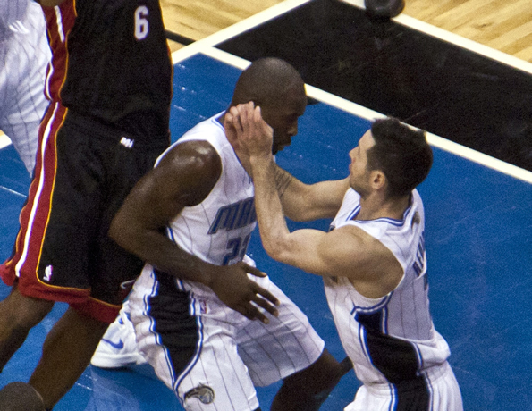 NBA players running into each other