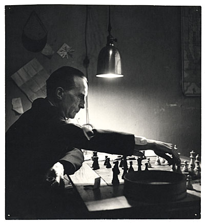 Marcel Duchamp playing chess