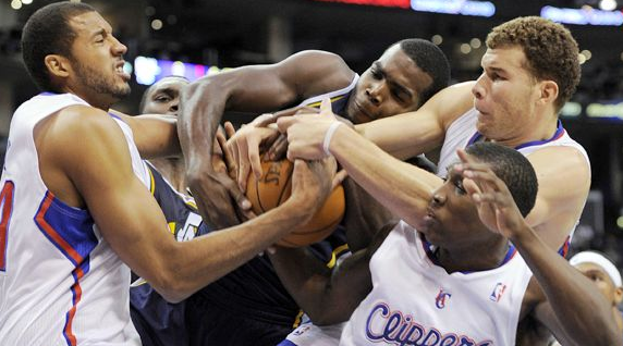 Five NBA players struggle for the ball