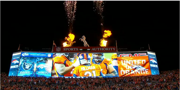 Flames shooting out of top of the scoreboard in Denver after the Denver Broncos score a touchdown