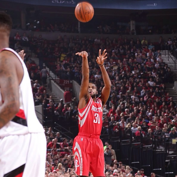 Troy Daniels shoots a 3-pointer for the Houston Rockets