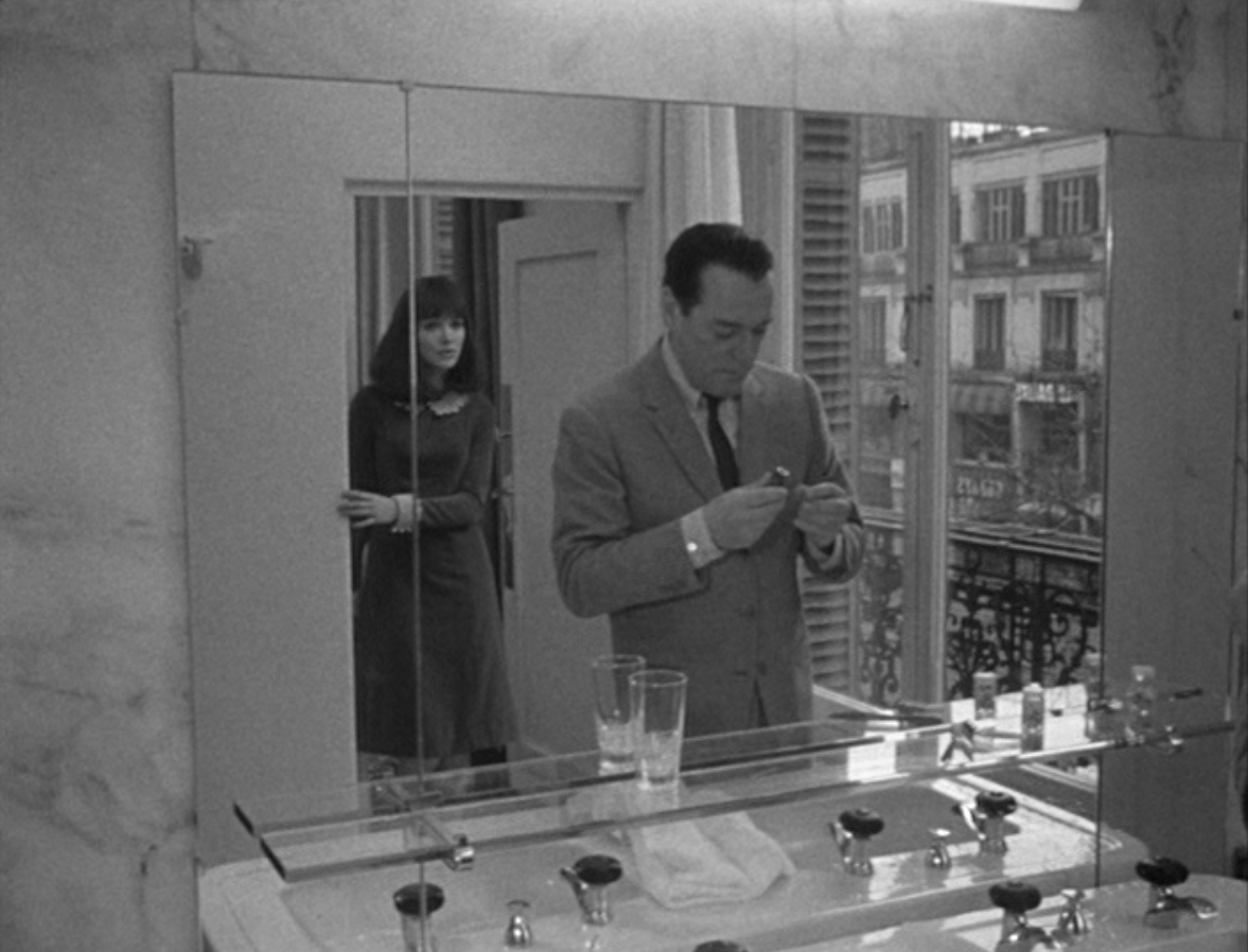 Eddie Constantine and Anna Karina in Alphaville