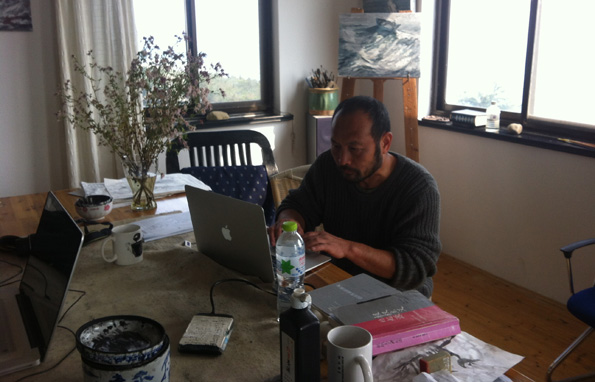 Hu Jie at his desk