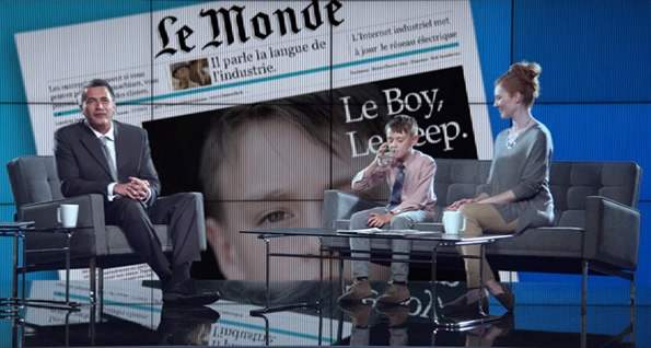 Still from a GE ad of a boy on a French talk show