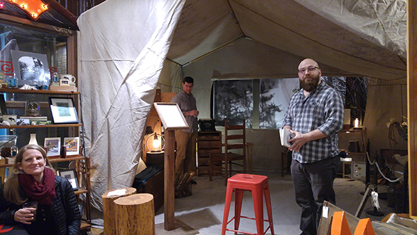 Matthew Young and Matthew Robinson in a tent at Boys Fort